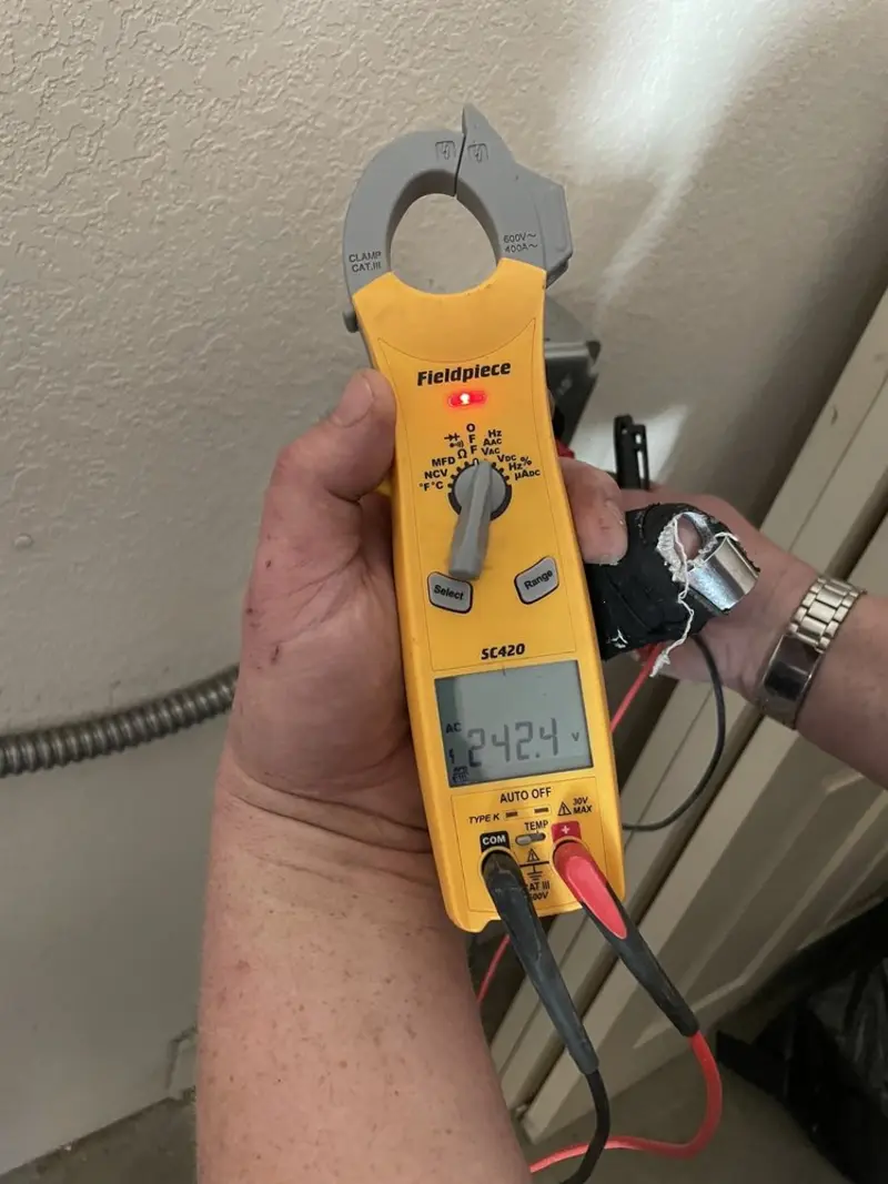 Voltage testing with clamp meter during Generator Installation in East Foothills